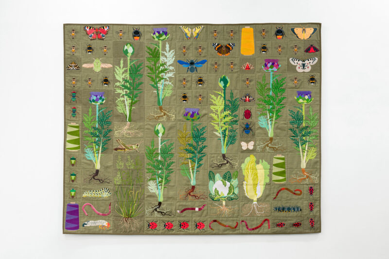 Image of Embroidered quilt with artichoke plants, green stinkbugs, cockchafer beetle larvae, earthworms, swallowtail butterfly caterpillar, greenbottle fly, honey bees, bumble bees, magpie moth, cockchafer beetle, peacock butterfly, meadow fescue grass, mottled grasshopper, red-tailed bumblebee, ladybirds, carpenter bee, swallowtail butterfly, cauliflower cabbage plant, red admiral butterfly, pet-saï cabbage plant, cabbage white butterfly, bluebottle fly, striped shield bug, red crimson underwing moth, jersey tiger moth, firebugs, red admiral butterfly caterpillar, Parnassius apollo butterfly, cinnabar moth, clouded orange butterfly and bobbins by Verdant Rooms